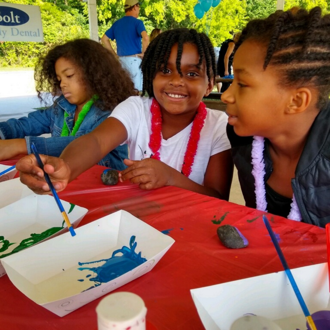 Children Laughing at a Table